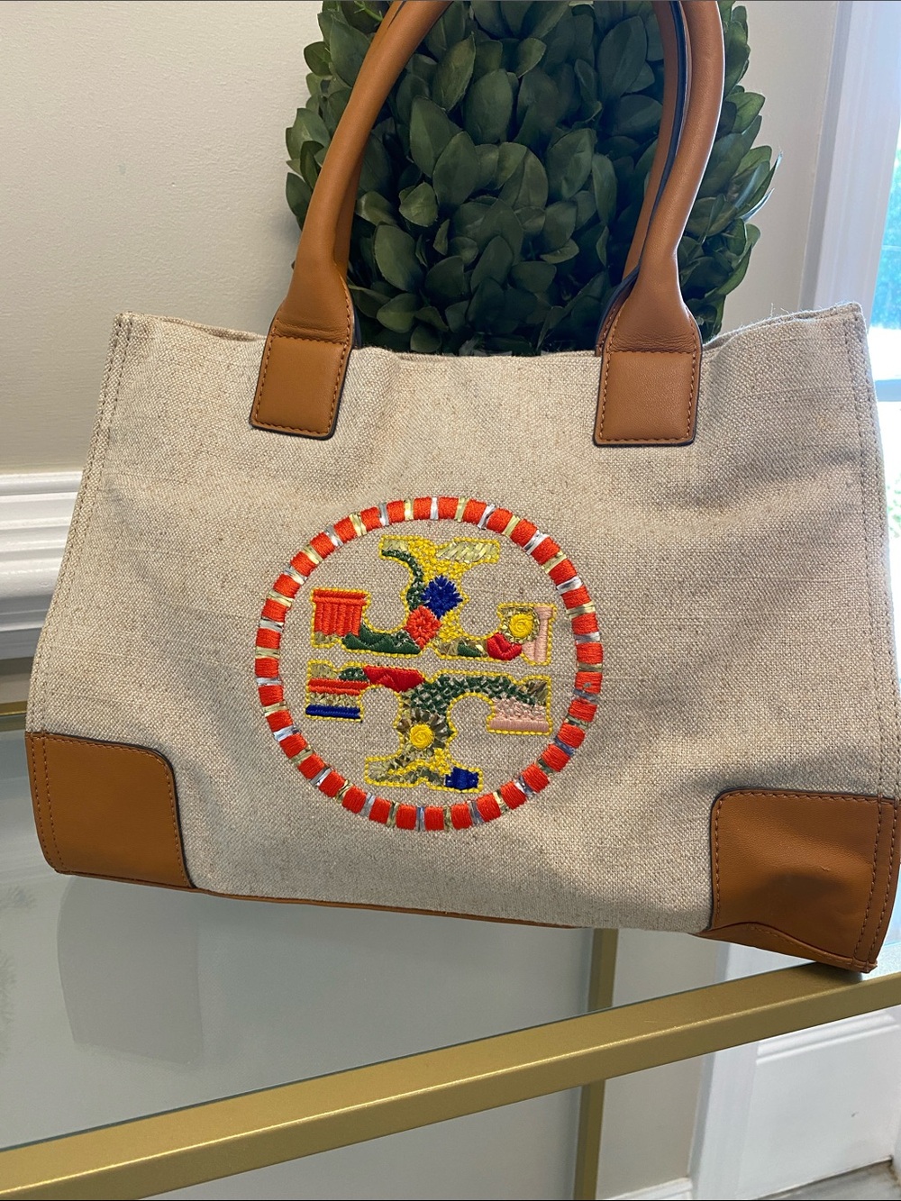 Tory Burch Canvas Tote with Tan Leather Trim and Embroidered Medallion